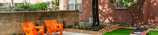Outdoor game area at The Can Plant Residences at Pearl, San Antonio, TX 78215