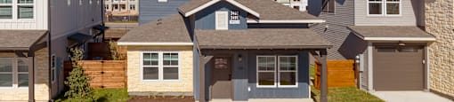 a house with a sidewalk in front of it