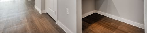a bedroom with a closet and a door to a hallway with a desk and shelves