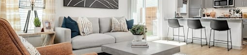 a living room with a couch and a coffee table