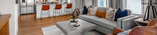 a living room with a couch and a table
