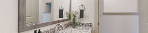 a bathroom with a sink and a mirror