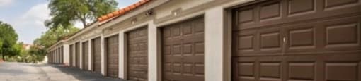a row of garages with brown doors  at Hayden on West Ave, San Antonio