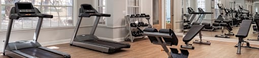 a fitness room with treadmills and other exercise equipment  at Hayden on West Ave, San Antonio, Texas