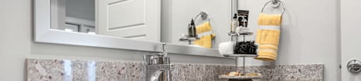 bathroom area of an apartment at ironridge at hill country village