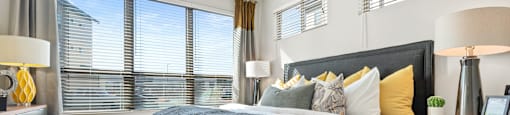 bedroom area of an apartment at ironridge at hill country village