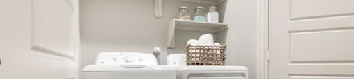 washer and dryer of an apartment at ironridge at hill country village