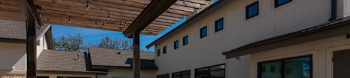 outdoor community area with grills for cooking at ironridge apartments