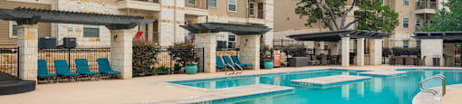 our apartments have a large swimming pool with chairs
