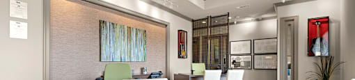 a dining room with a table and chairs
