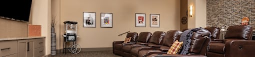 a large room with couches and a television