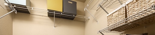 a spacious walk in closet in a bedroom plus den unit