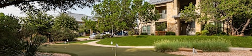 a putting green in front of a building