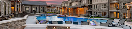 the preserve at ballantyne commons outdoor amenities include a pool and grilling stations