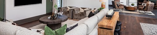 a living room with a couch and a tv