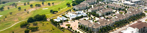 arial view of the campus with the water tower in the distance