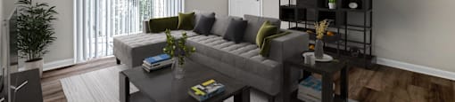 a living room with a couch and a coffee table