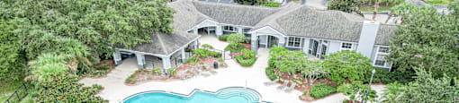 an aerial view of the pool at the estates at spring valley