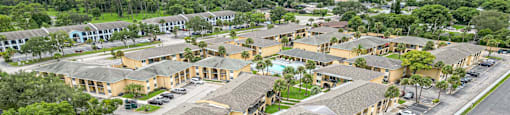 an aerial view of a neighborhood of houses and streets