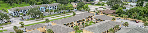 a birds eye view of the resort style pool at the village apartments