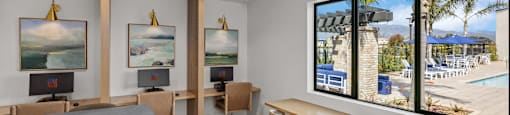 a living room with a table and chairs and a large window at Westbury Apartments, Rancho Cucamonga, 91739