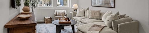 a living room with a couch and a tableat Westbury Apartments, Rancho Cucamonga, 91739
