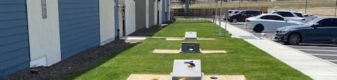 a row of ping pong tables in the grassat Westbury Apartments, Rancho Cucamonga, CA