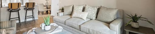 Living Room With Kitchen at The Oaks Apartments, Upland, California