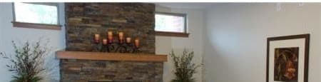 common area with a fireplace and leather furniture