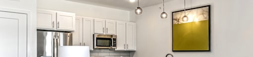 Gourmet Kitchen with Breakfast Bar and Pantry, at 1415 @ The Yard, Omaha, NE 68102