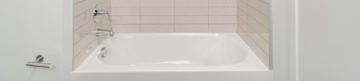 Bathrooms featuring quartz countertops extra storage and space at Pinnacle Heights Apartments at Rogers, Arkansas.