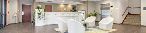 Modern clubhouse featuring community lounge, coffee bar, salon and spa, billiards and poker room, and concierge package room at Parkside Apartments and Shops in Bentonville, AR