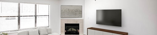 Living room with fireplace at Parkwood Terrace in Omaha, NE