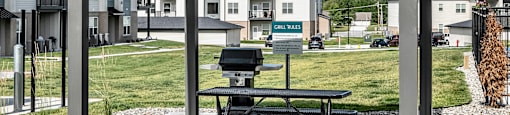Outdoor picnic and grill area at Tiburon Ridge, Omaha, 68136