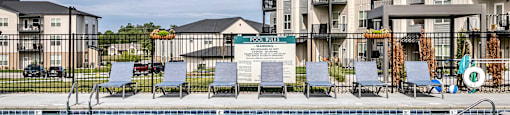  swimming pool with exterior building view at Tiburon Ridge, Omaha, NE 68136