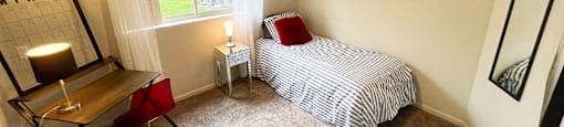 Spacious bedroom in East Lansing Apartments near Michigan State University | Cedar Greens