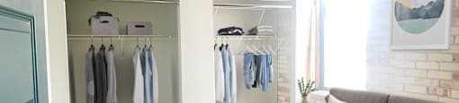 a bedroom with a bed and a closet