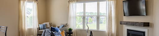 Living room at Quarry Apartments and Townhomes in DeWitt Michigan
