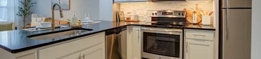 Modern kitchen at Vista at the Heights Apartments in Lansing, MI