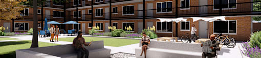 A group of people are sitting on benches in a courtyard.
