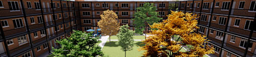 A courtyard with a tree in the middle and a person standing on the balcony.