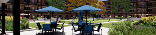 A courtyard with tables and chairs and umbrellas.