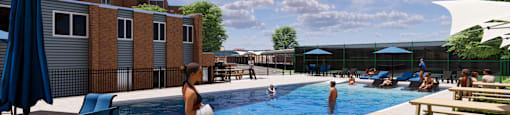 A woman is standing by a pool on a sunny day.