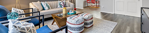a living room with a couch and a table