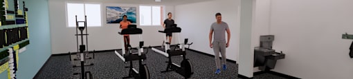 A gym with exercise equipment and two people.