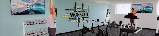 A woman is stretching in a gym with a wall of equipment behind her.