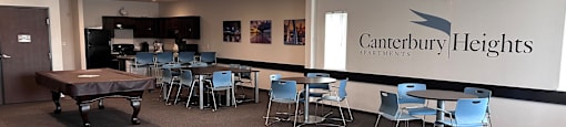 A room with Canterbury Heights written on the wall.