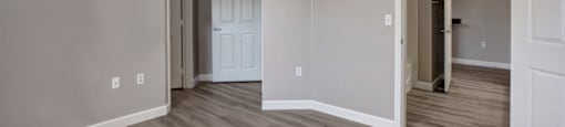 an empty room with a ceiling fan