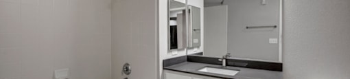 a bathroom with a sink toilet and bathtub