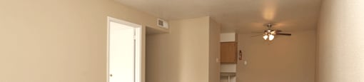 Living room leading to kitchen
